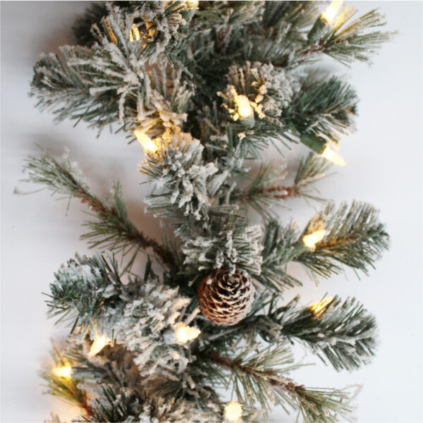 9-foot Snowy Spruce Artificial Christmas Garland Pre-lit with 100 Clear Incandescent Lights